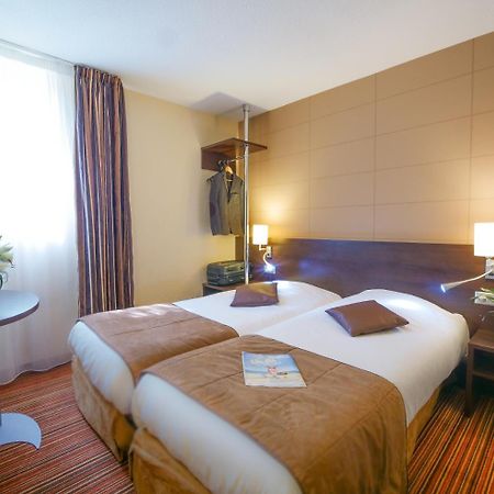 Hotel Inn Design Resto Novo Alencon Bagian luar foto