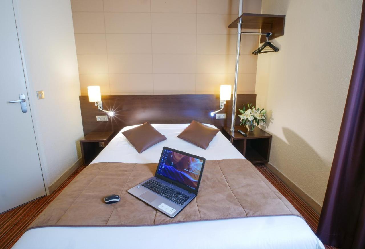 Hotel Inn Design Resto Novo Alencon Bagian luar foto