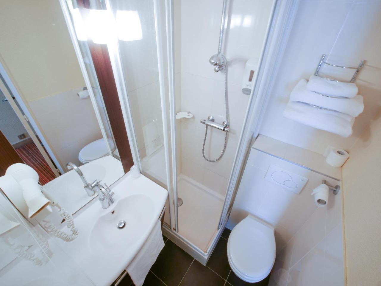 Hotel Inn Design Resto Novo Alencon Bagian luar foto